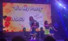 Performers on stage are celebrating the song