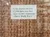 The image shows a display with over 62,000 faces of soldiers, each representing two Americans killed in World War I, accompanied by an explanatory note.