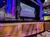 The image shows a theater stage set for a