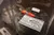 The image shows a display of a vintage fishing lure called the 