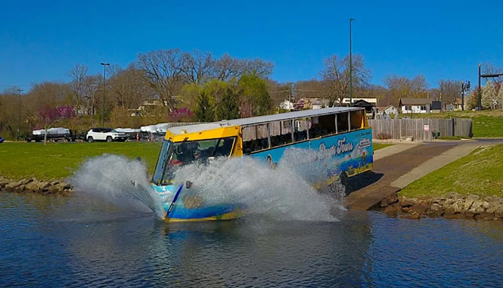 An amphibious tour bus is depicted in mid-splash as it enters the water from a ramp