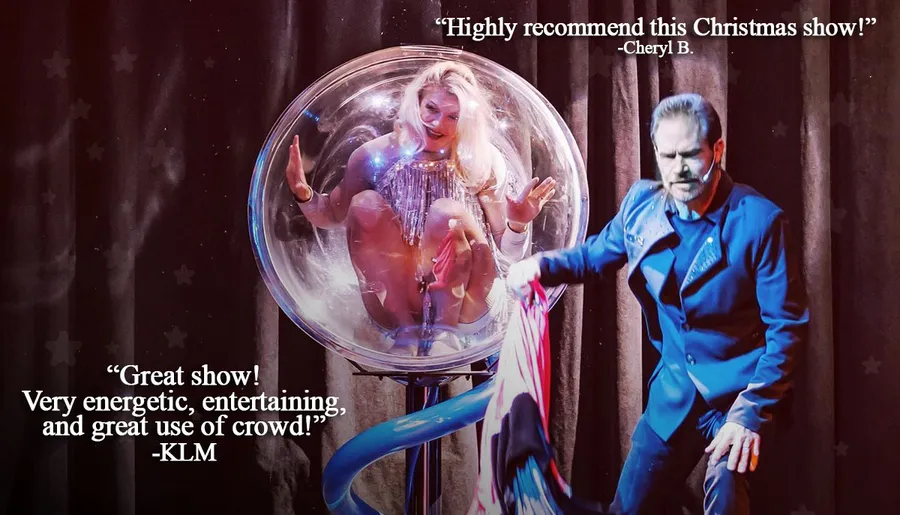 A performer is inside a transparent sphere while another person in a blue outfit participates in a stage show, accompanied by positive audience reviews.