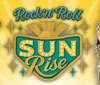 A man in a blue and black outfit is reclining on a blue sofa with a guitar next to a vibrant RocknRoll SUN Rise sign