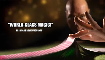 A person skillfully fans a deck of cards, accompanied by a glowing review saying 