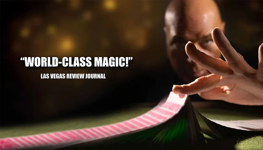 A person skillfully fans a deck of cards accompanied by a glowing review saying World-Class Magic from the Las Vegas Review Journal