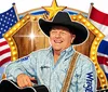 The image features a man in a cowboy hat playing guitar with American flags in the background and text reading George Strait Tribute