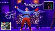 A festive stage performance features a person dressed in a Santa-themed outfit with outstretched arms, surrounded by Christmas decorations and graphics promoting a holiday show.