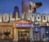 The image depicts the Hollywood Wax Museum distinguished by its large HOLLYWOOD sign and a wax figure of King Kong climbing the building