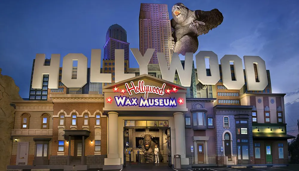 The image depicts the Hollywood Wax Museum distinguished by its large HOLLYWOOD sign and a wax figure of King Kong climbing the building