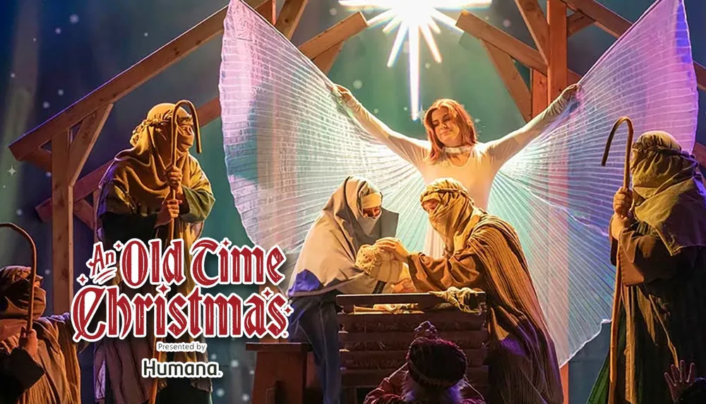 A nativity scene is depicted with a group of people dressed in biblical costumes an angel with wings and the text An Old Time Christmas Presented by Humana