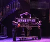 The image promotes a highly acclaimed magic show featuring a performer levitating a woman with enthusiastic reviews and accolades like Illusionist of the World and a 1 show rating