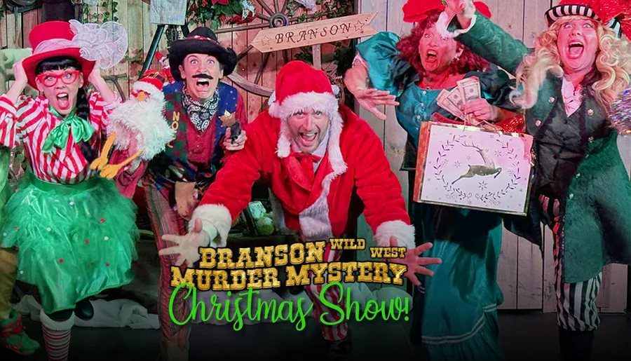 Four people are dressed in colorful and theatrical Christmas-themed costumes, expressing exaggerated emotions in what appears to be a festive play or performance.