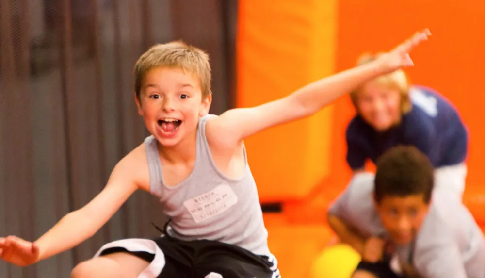 Child Playing at the Trampoline Park