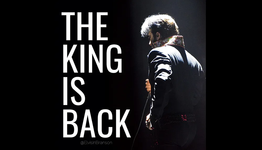 A man dressed in a black jacket stands holding a microphone next to the bold text THE KING IS BACK